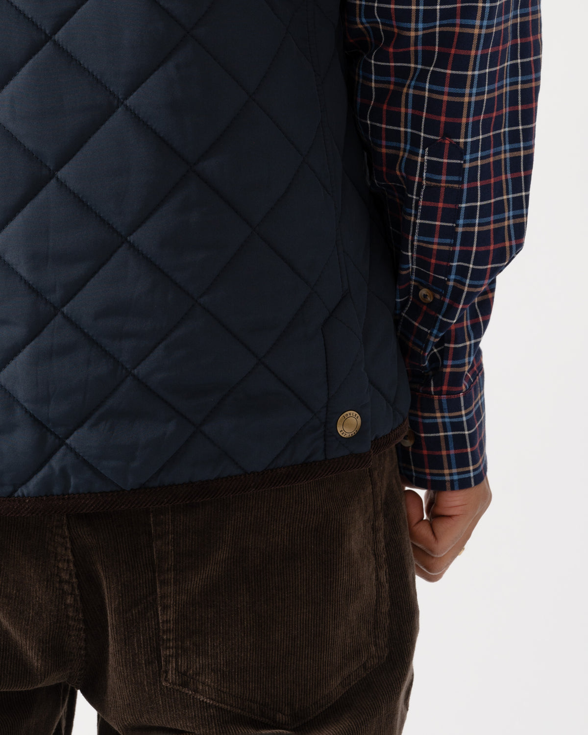 Back popper on the Joules Maynard Mens Quilted Gilet - Navy