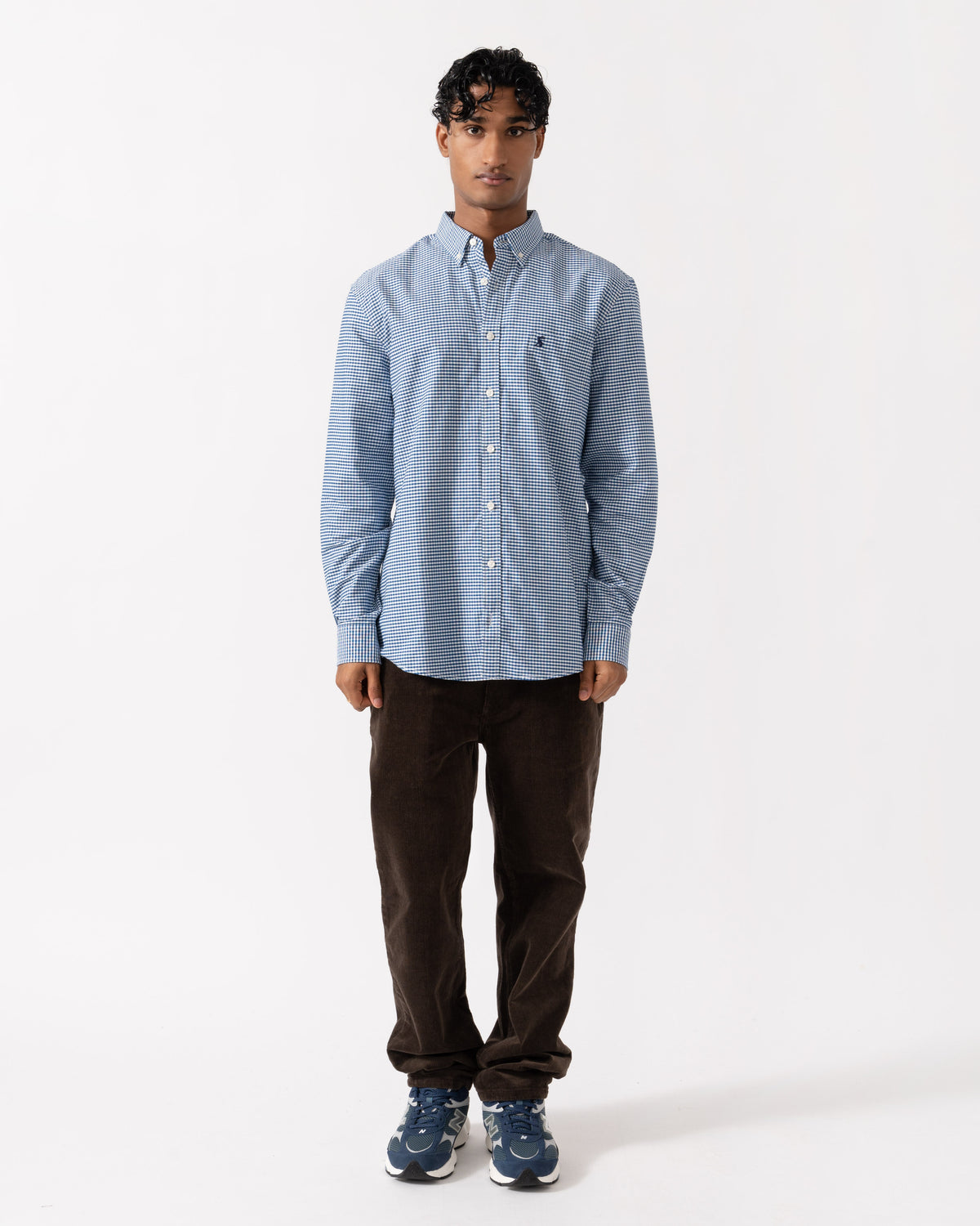 Man wearing the Joules Mens Classic Fit Gingham Oxford Shirt - Navy Check