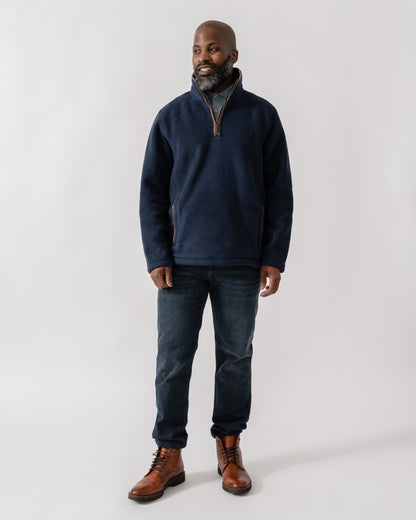 Model wearing Joules Mens Heritage 1/4 Zip Fleece in Navy - full length