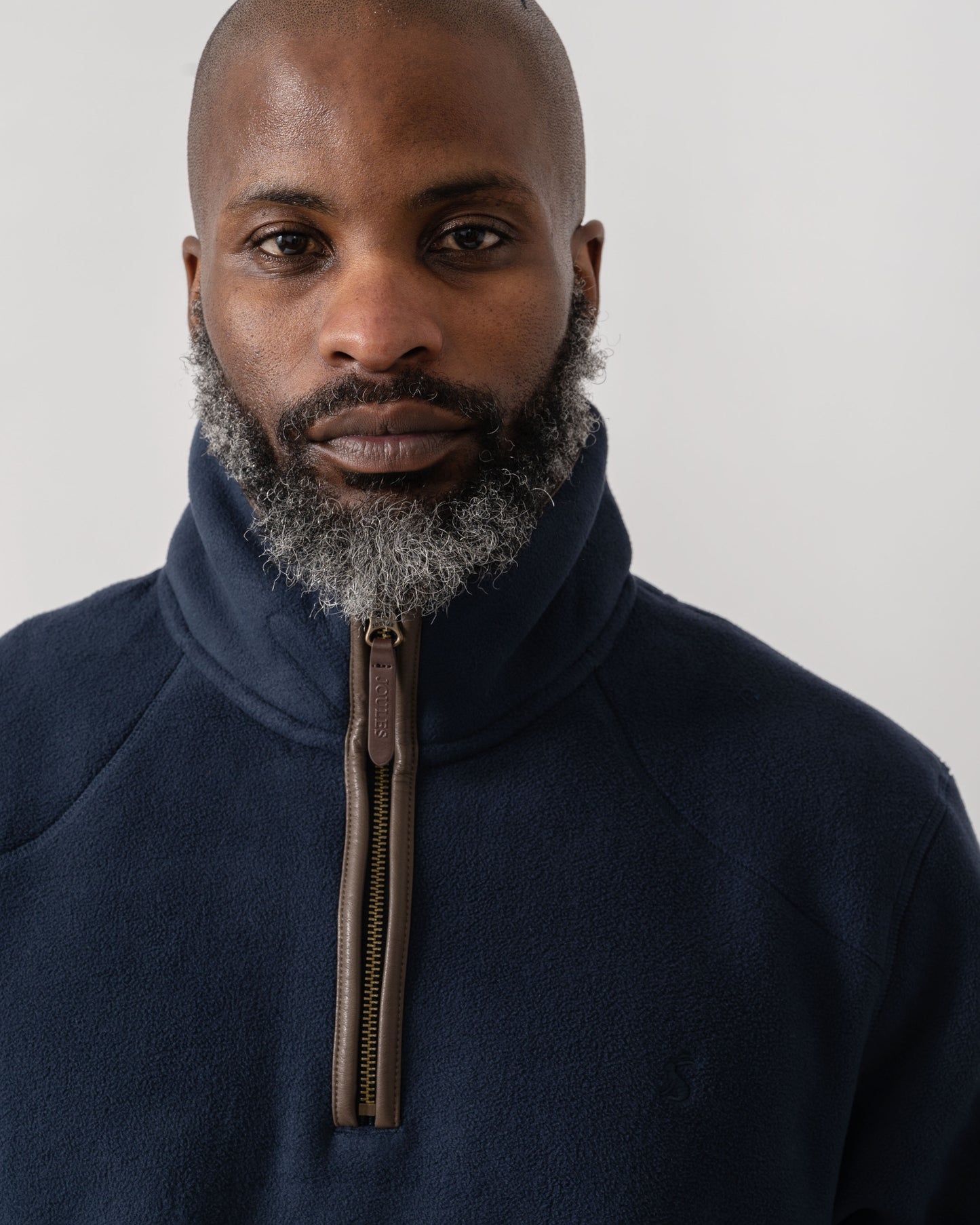 Model wearing Joules Mens Heritage 1/4 Zip Fleece in Navy - detail