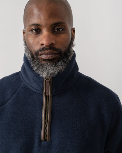 Model wearing Joules Mens Heritage 1/4 Zip Fleece in Navy - detail