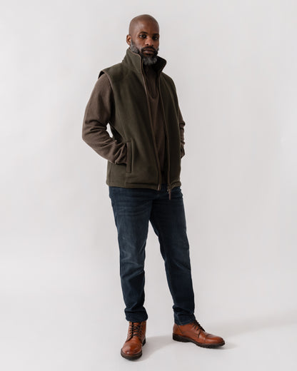 Model wearing Joules Mens Heritage Fleece Gilet in Green - Full Length