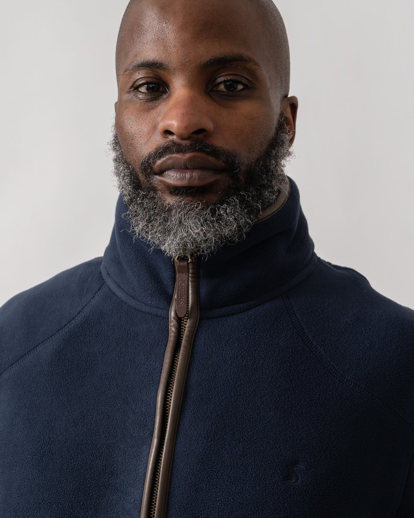 Model wearing Joules Mens Heritage Full Zip Fleece in Navy - Detail