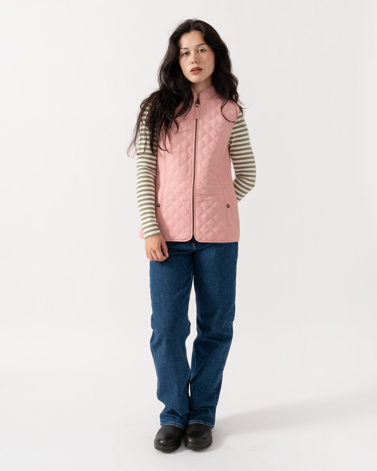 Model wearing the Joules Minx Womens Diamond Quilt Gilet - Pink