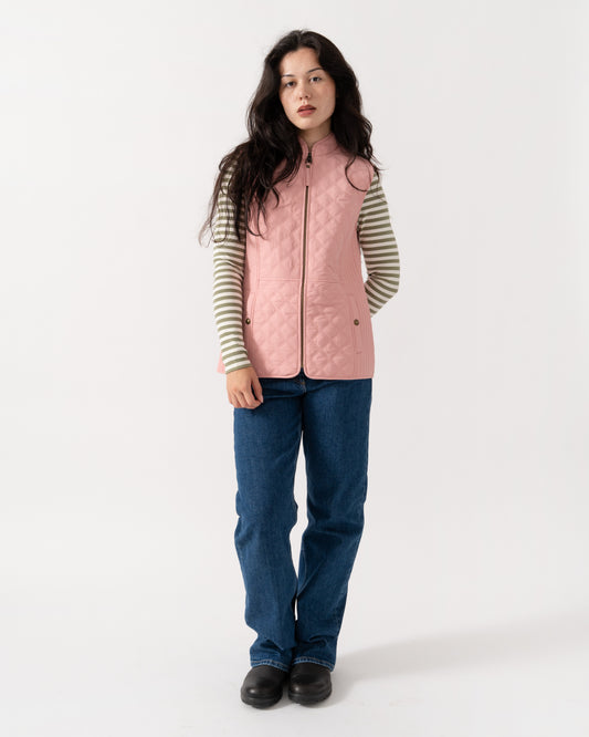 Model wearing the Joules Minx Womens Diamond Quilt Gilet - Pink