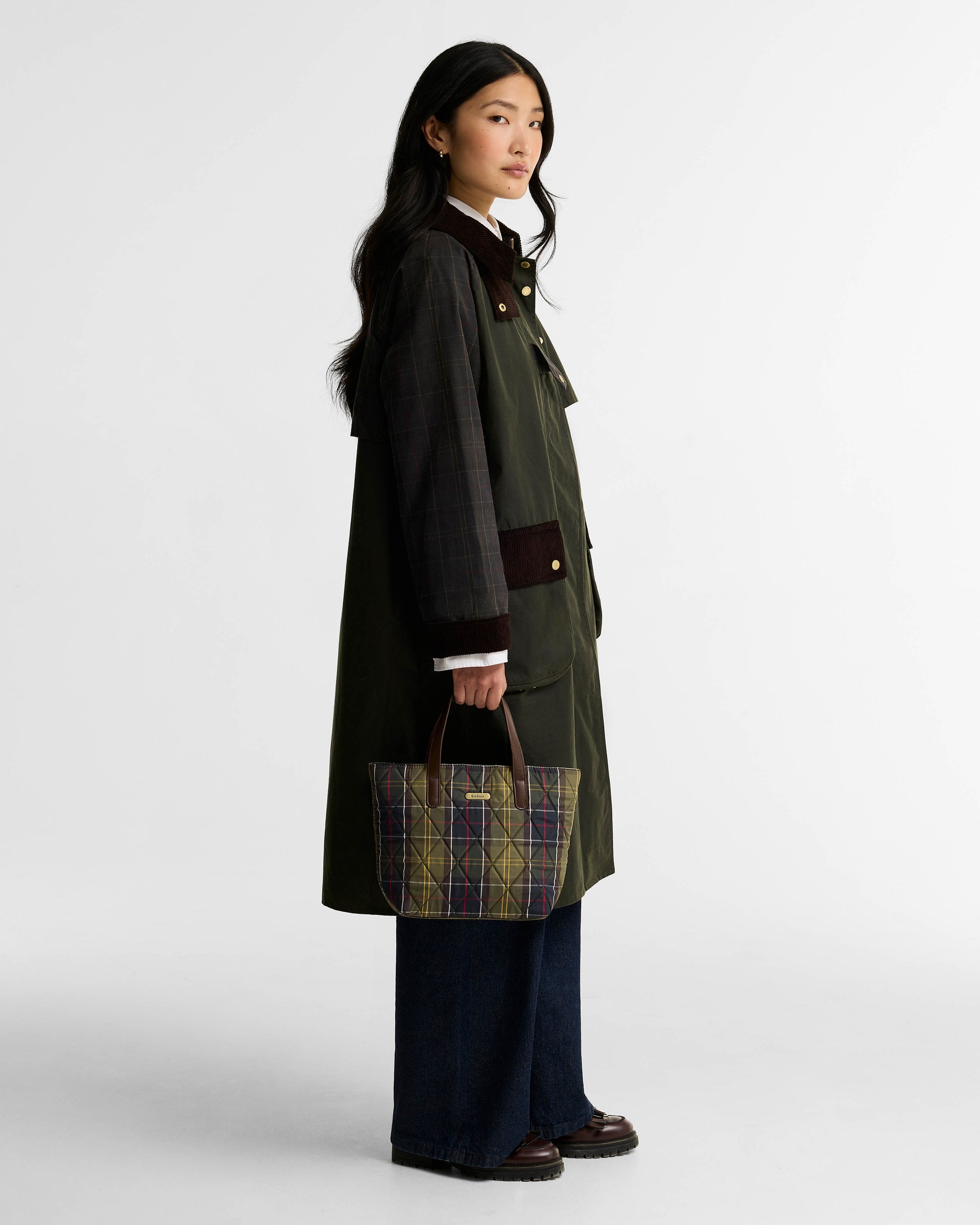 Barbour Womens Mini Quilted Tote Bag in Classic Tartan on model, in hand