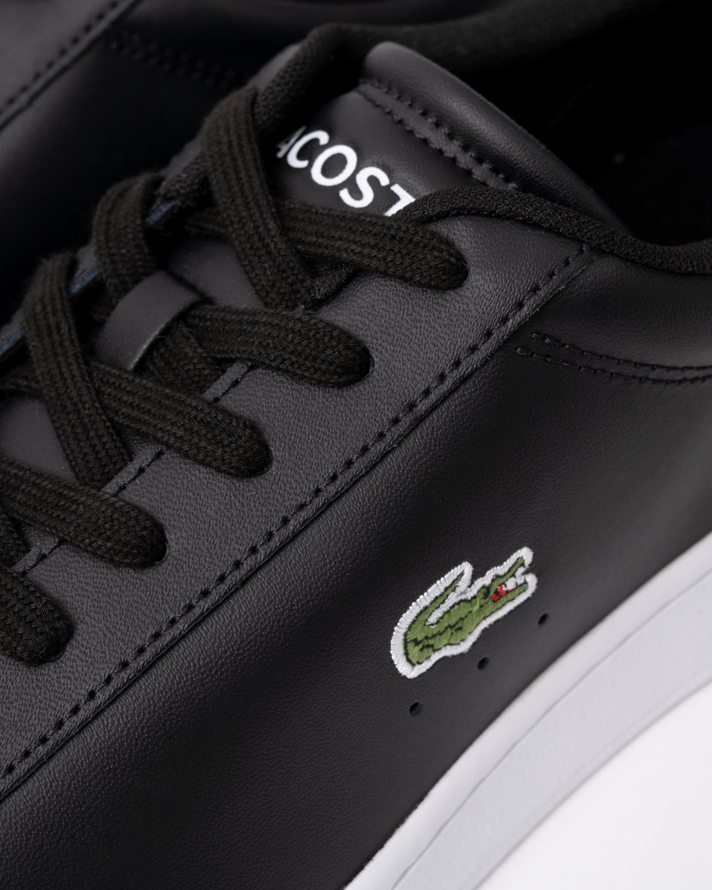 detail of Lacoste Carnaby Leather Mens Trainers in Black-White 312