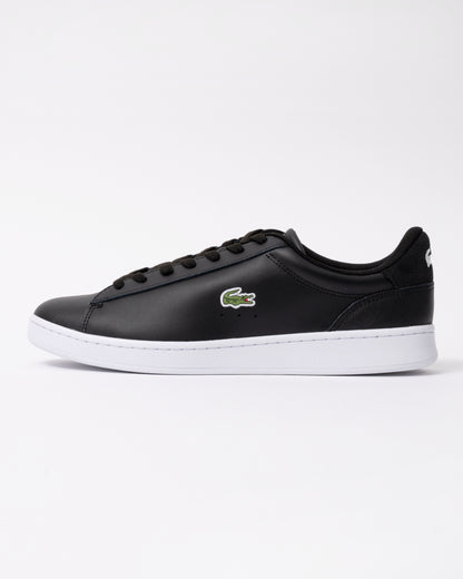 side view of Lacoste Carnaby Leather Mens Trainers in Black-White 312