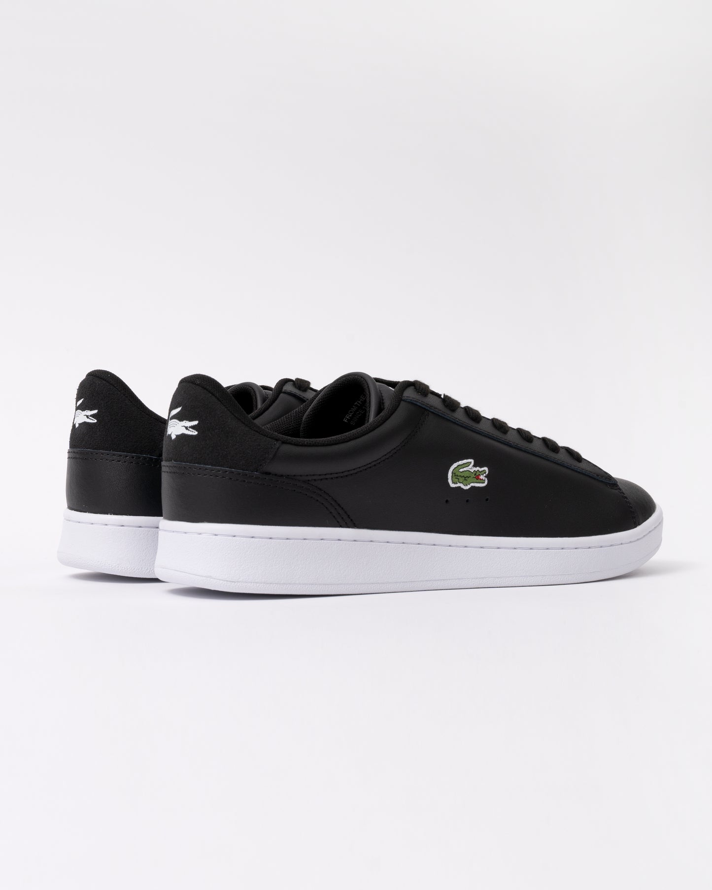 reverse view of Lacoste Carnaby Leather Mens Trainers in Black-White 312