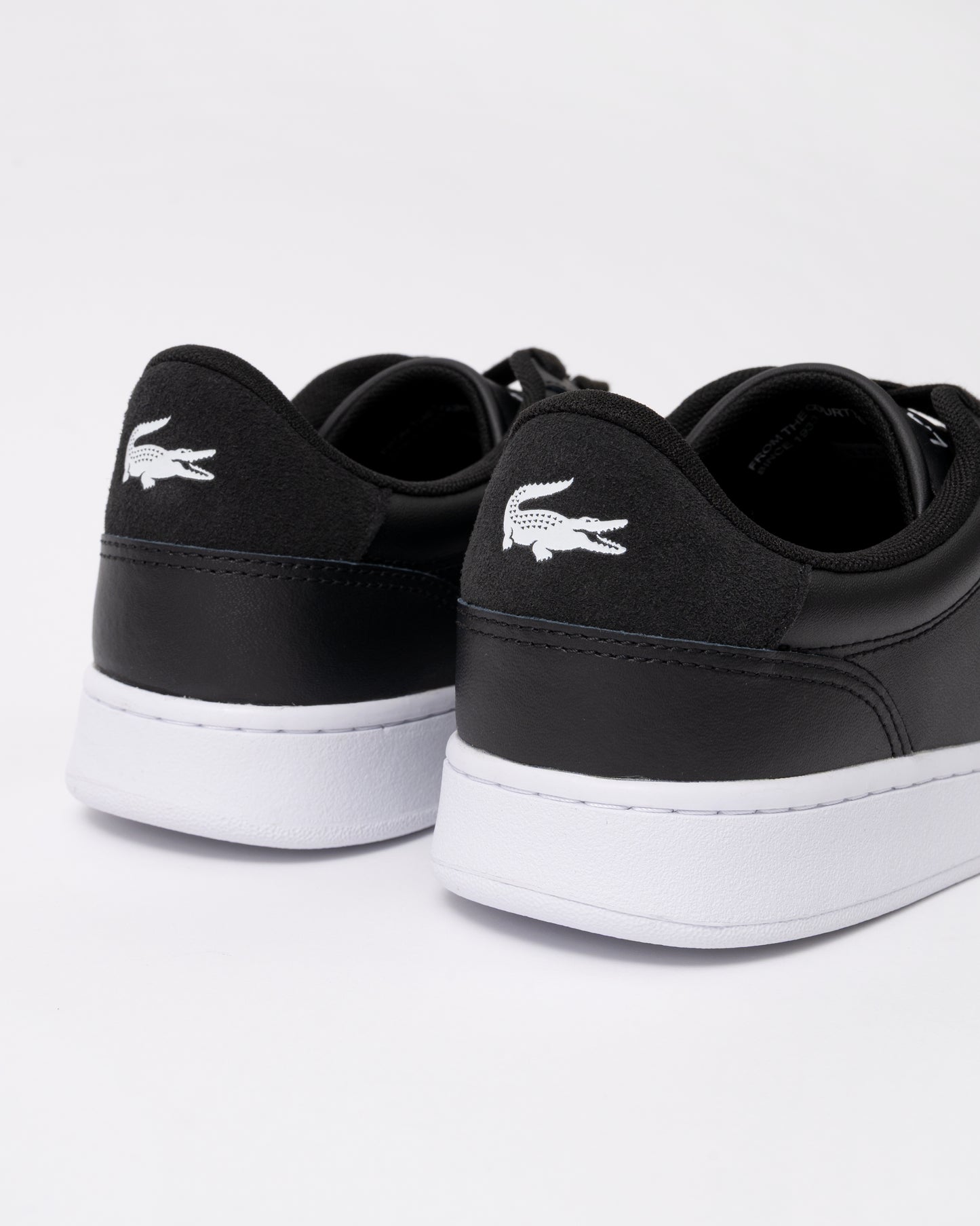 back of Lacoste Carnaby Leather Mens Trainers in Black-White 312