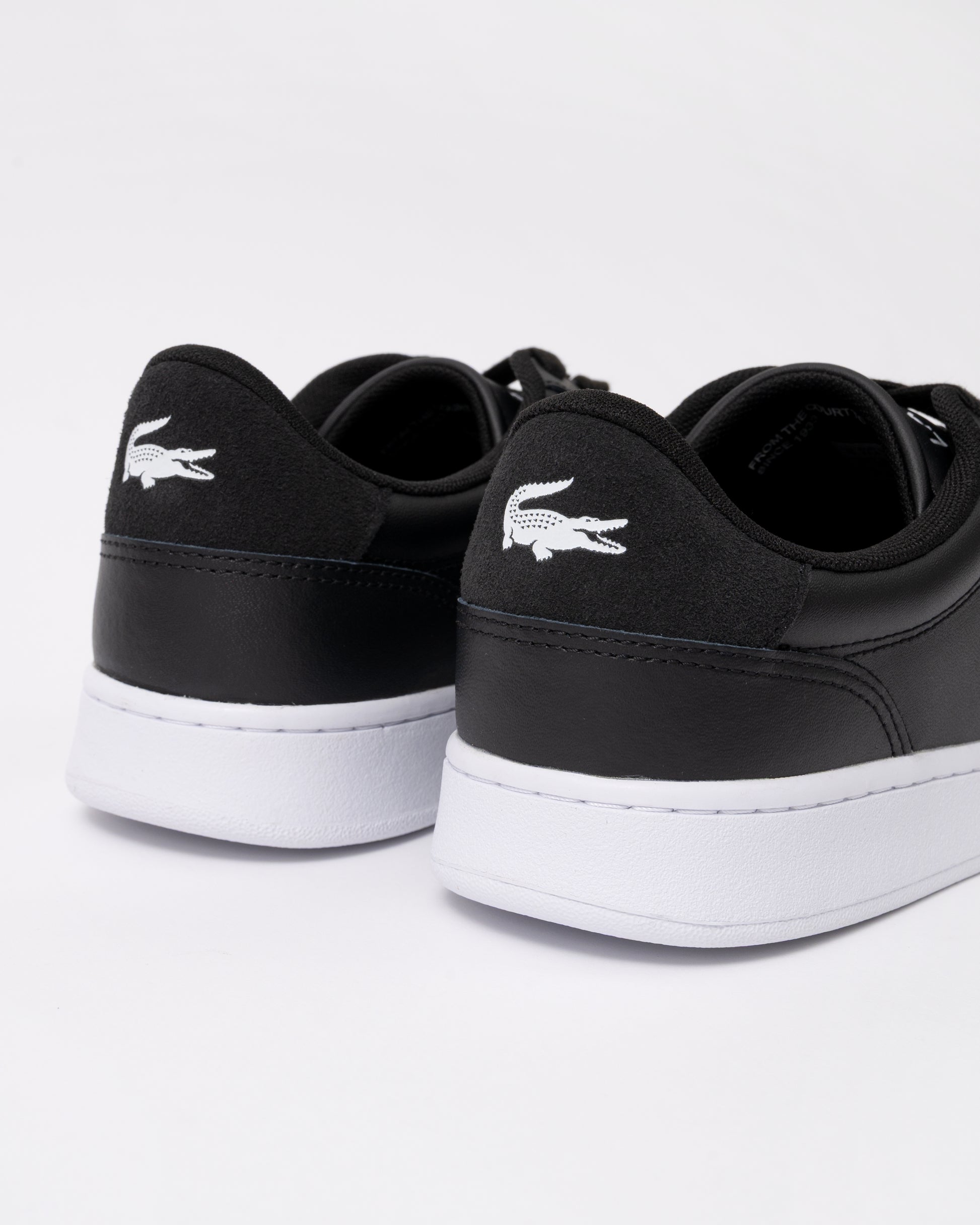 back of Lacoste Carnaby Leather Mens Trainers in Black-White 312