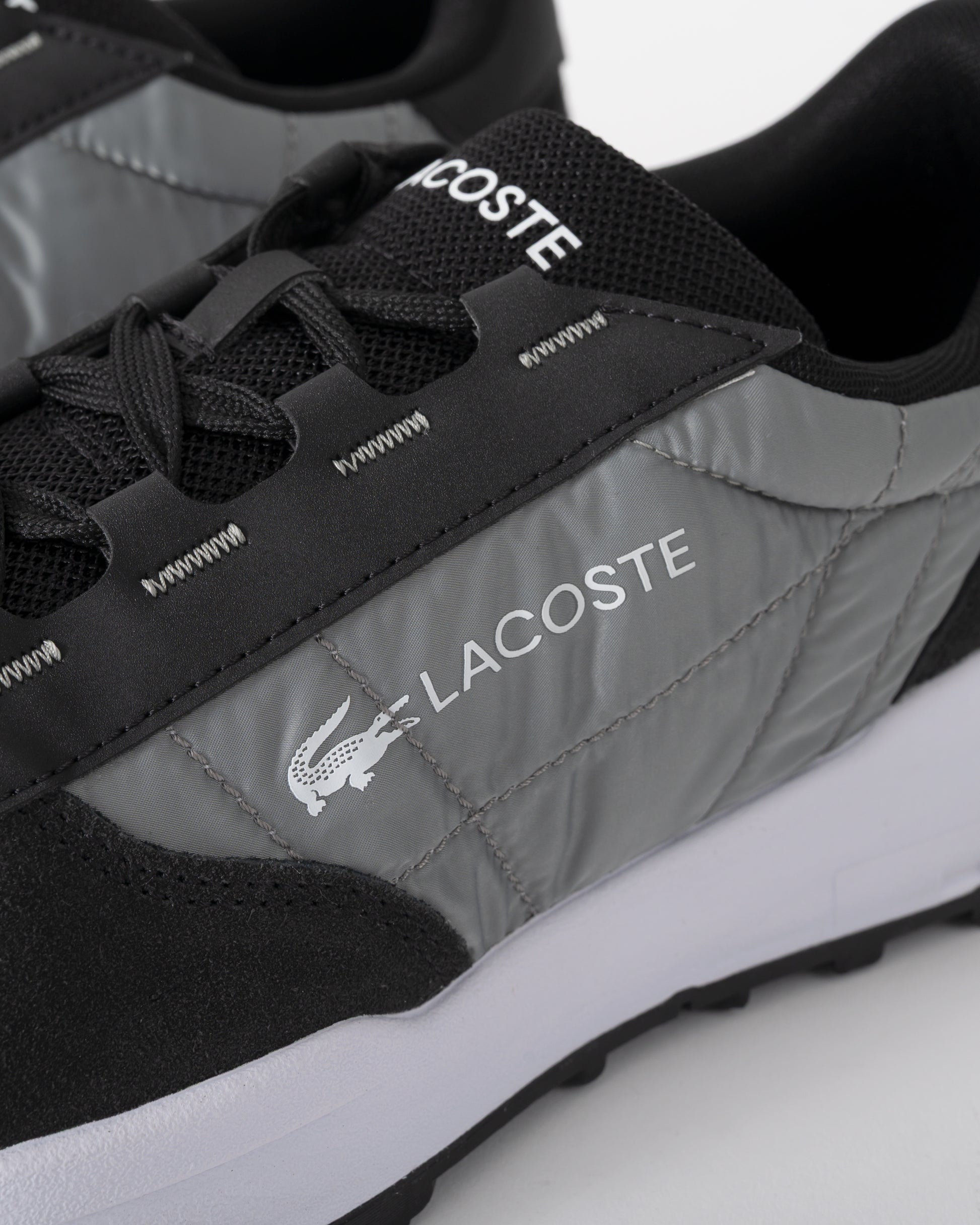 detail of Lacoste Elite Active Evo Mens Trainers in Black and White