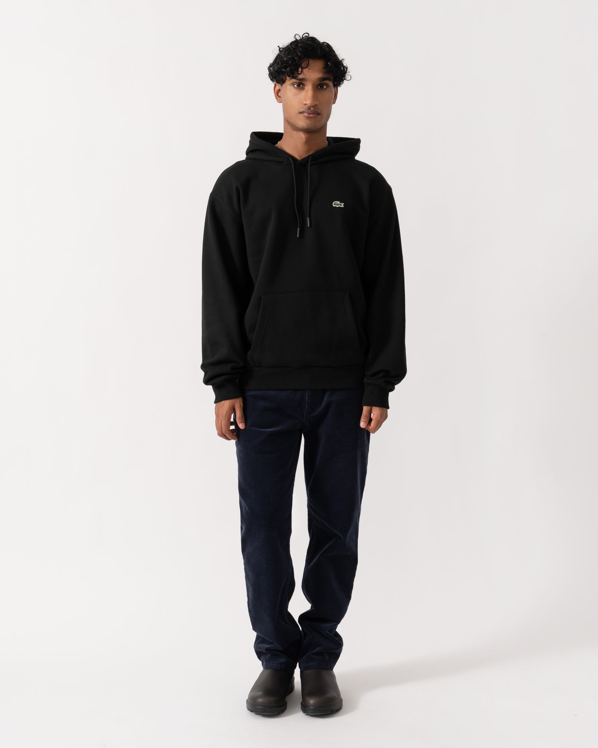 Man wearing Lacoste Fleece Mens Classic Fit Hoodie - Black 031