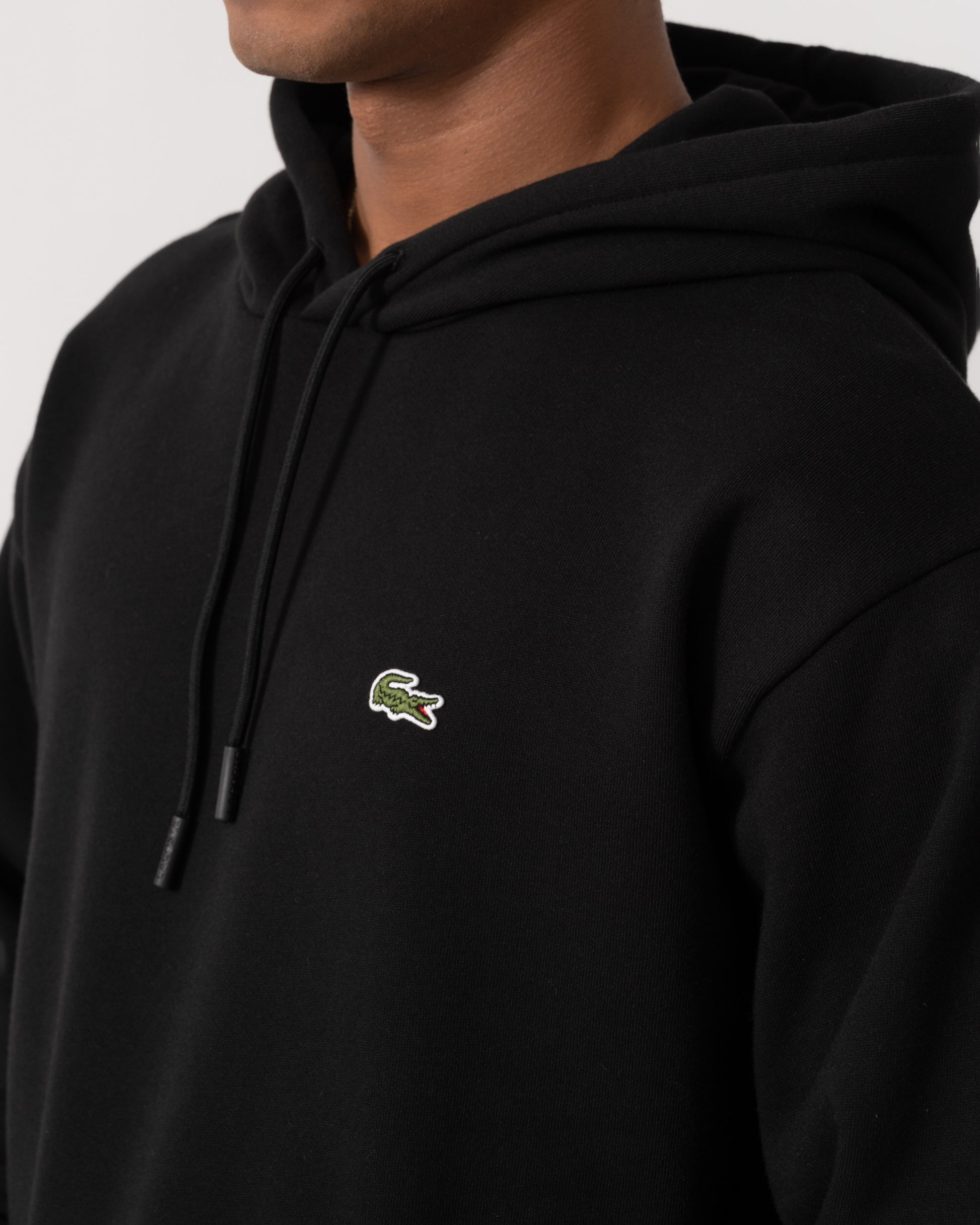 Close up of Lacoste Fleece Mens Classic Fit Hoodie - Black 031