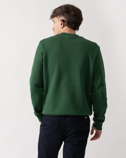 back shot of a model wearing a Lacoste Mens Crew Neck Fleece Sweatshirt in Green 132