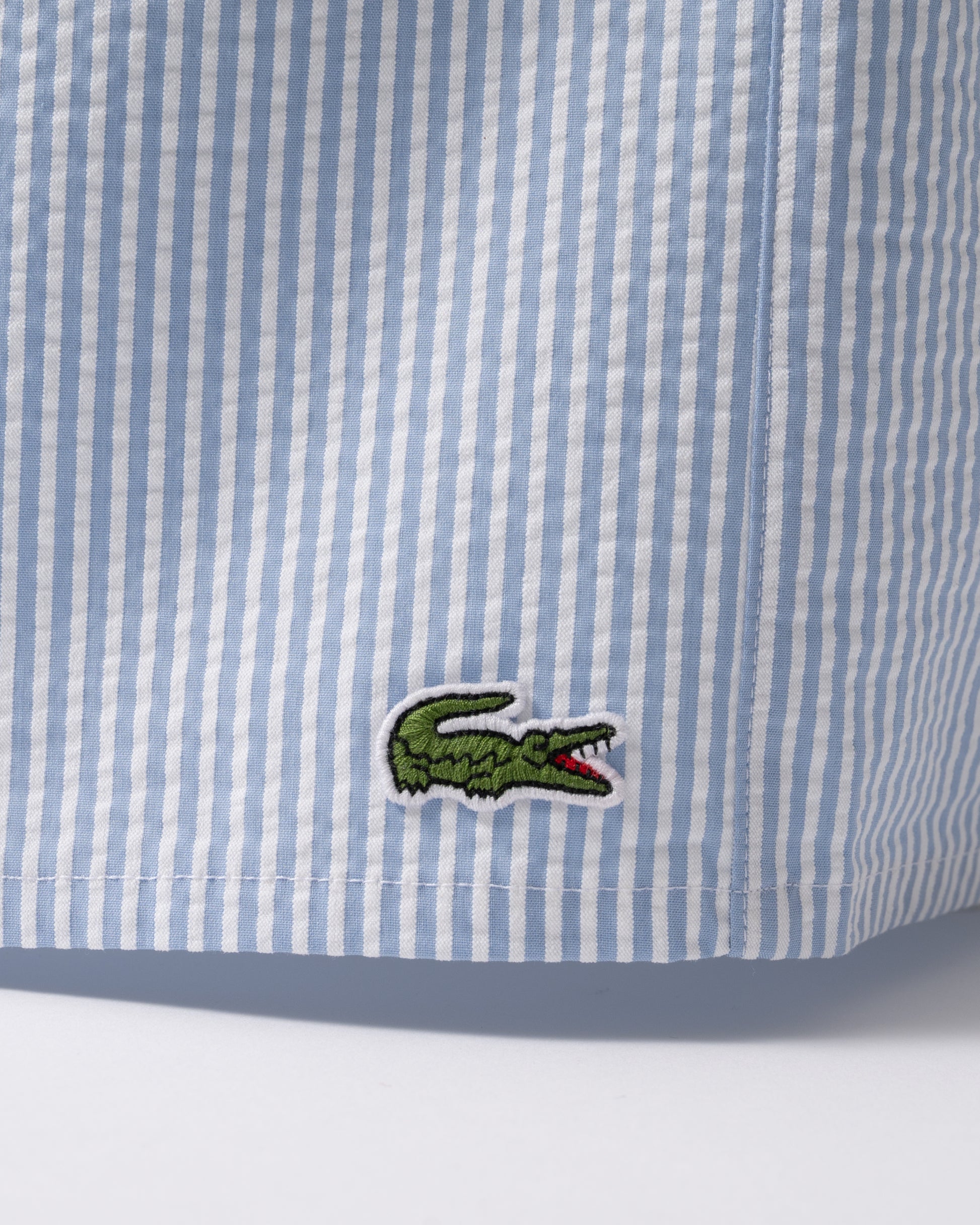 logo detail of Lacoste Mens Swimming Shorts in White-Aphylla