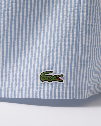 logo detail of Lacoste Mens Swimming Shorts in White-Aphylla