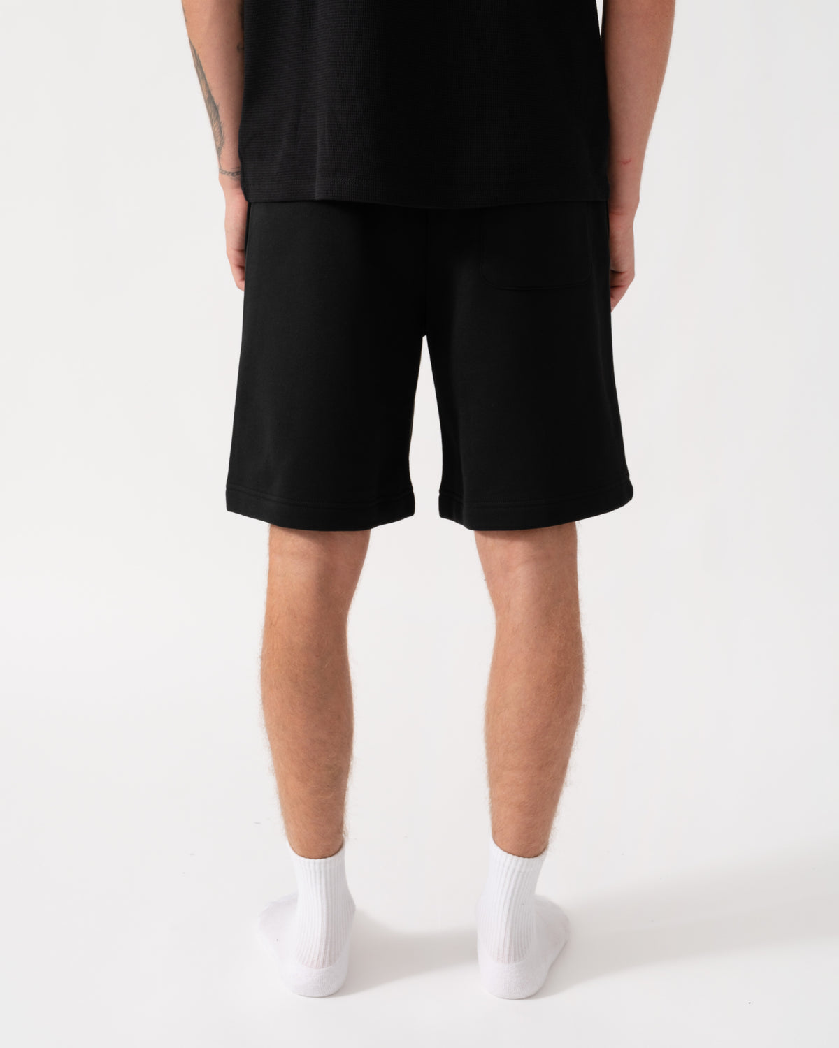 Back of the Lacoste Regular Fit Mens Fleece Shorts - Black 031