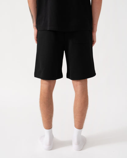 Back of the Lacoste Regular Fit Mens Fleece Shorts - Black 031