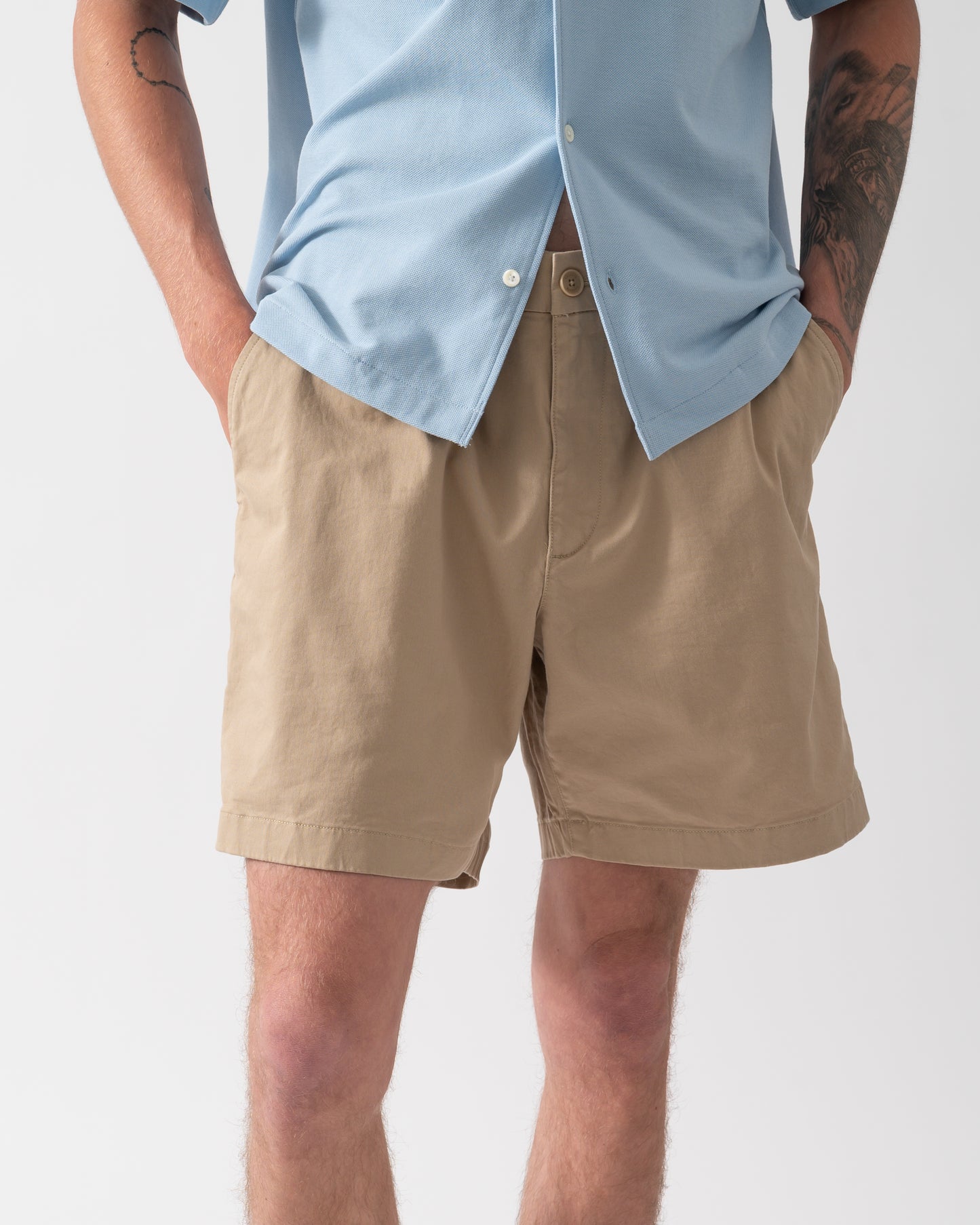 front of model wearing Lacoste Relaxed Fit Mens Stretch Cotton Shorts in Viennese 02S