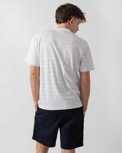 back shot of a model wearing Lacoste Stripe Mens Classic Fit T-Shirt in Phoenix Blue-Flour