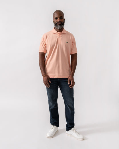 Model wearing Lacoste Classic Fit L.12.12 Mens Short Sleeve Polo Shirt in Miami UI2 - Full Length