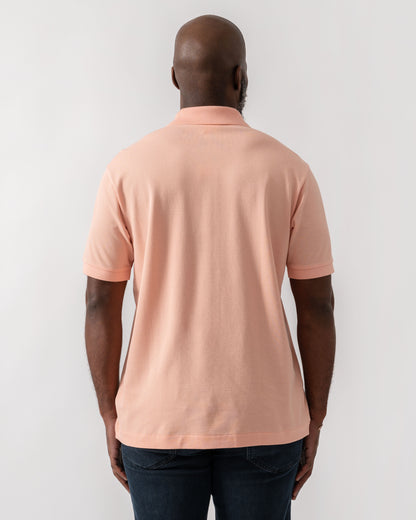 Model wearing Lacoste Classic Fit L.12.12 Mens Short Sleeve Polo Shirt in Miami UI2 - Back