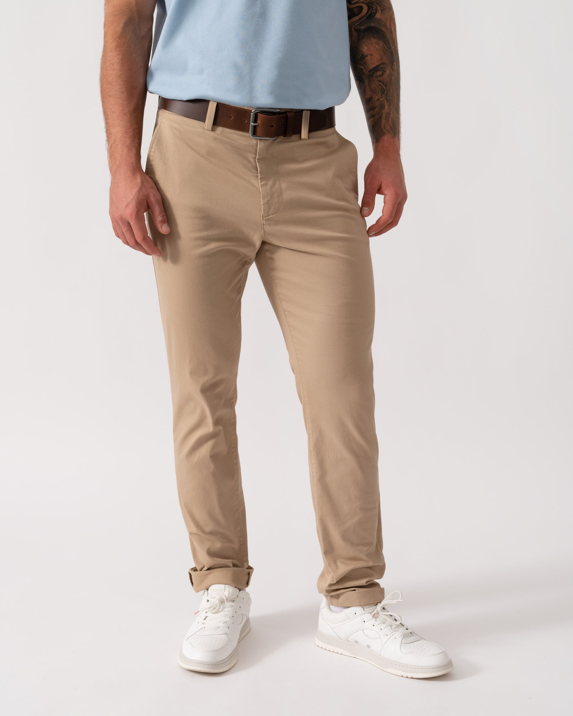 Model wearing Lacoste Slim Fit Stretch Cotton Mens Chinos in Viennese 02S - Main