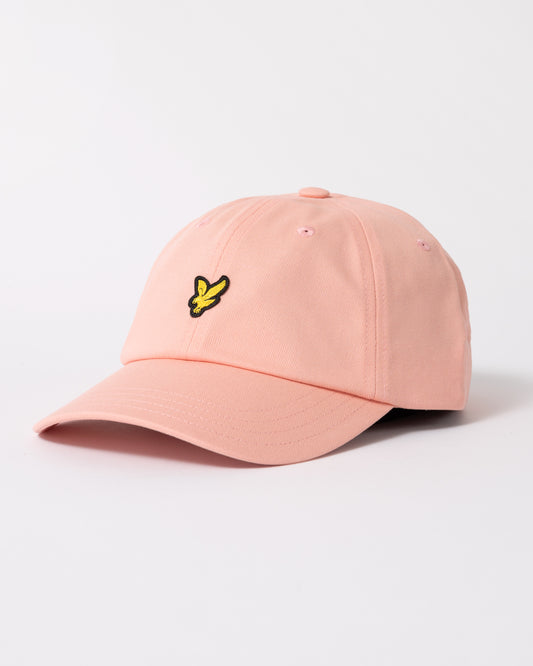 side of Lyle & Scott Baseball Cap in Y120 Pink Grapefruit