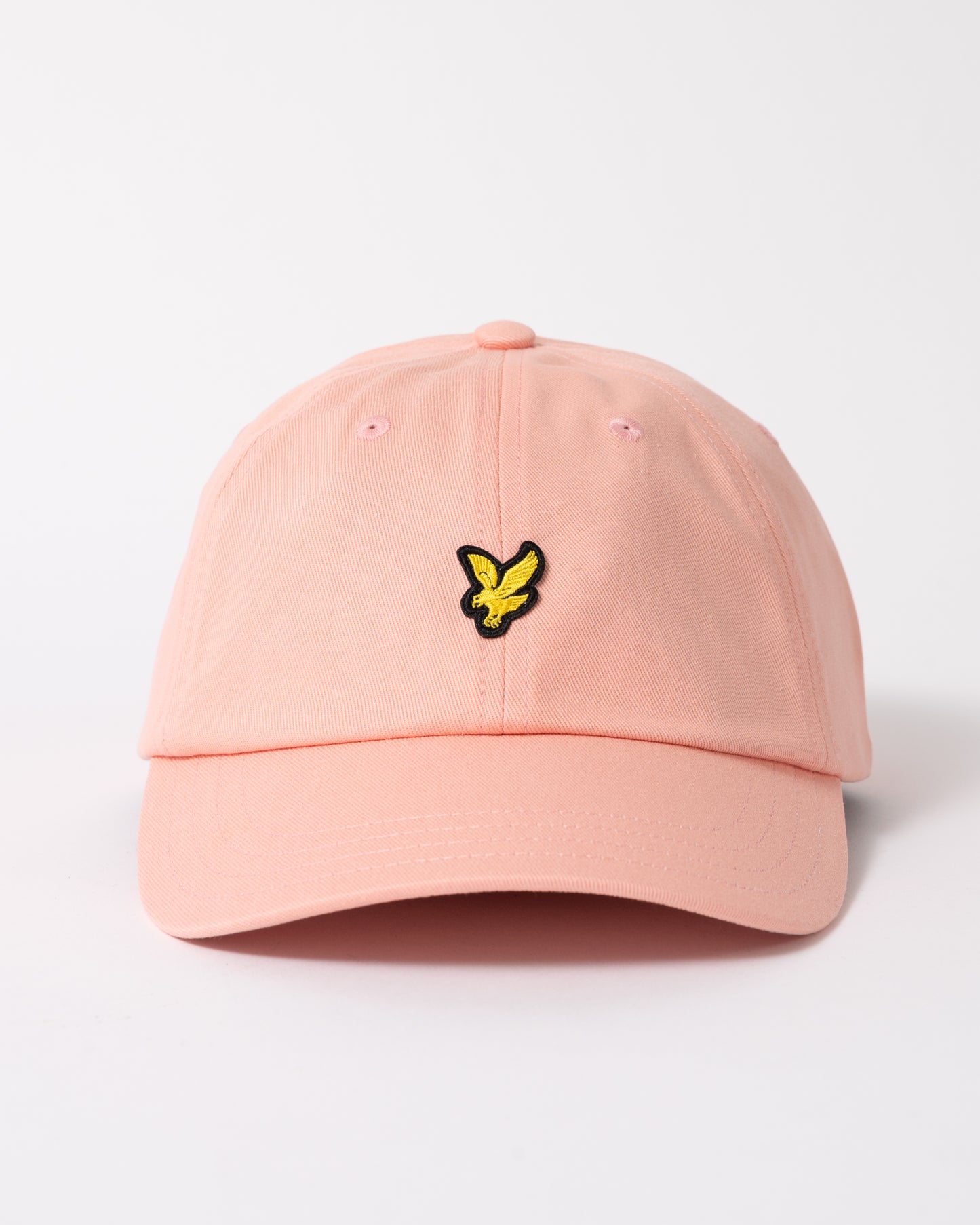 front of Lyle & Scott Baseball Cap in Y120 Pink Grapefruit