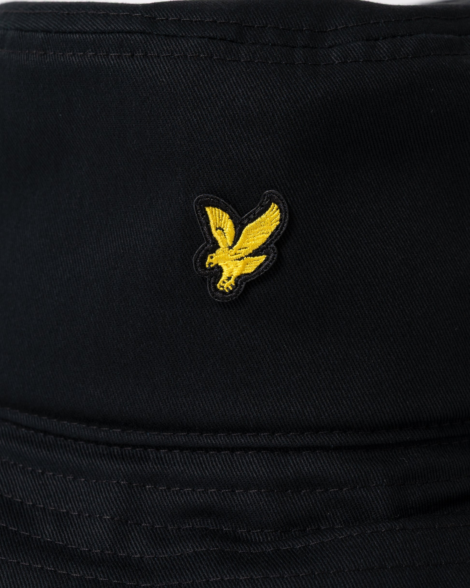 logo detail of of Lyle & Scott Bucket Hat in Z865 Jet Black