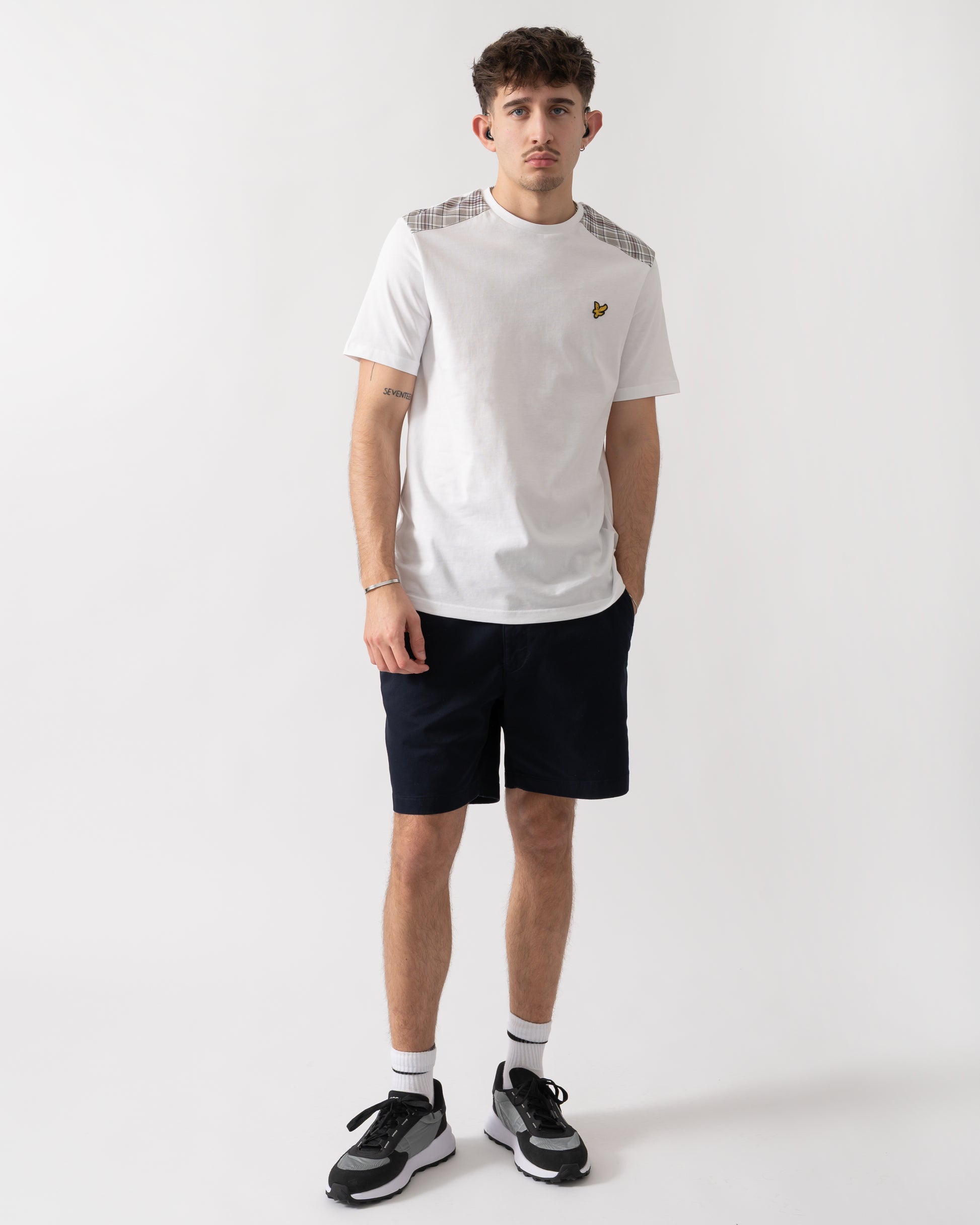 full length shot of a model wearing a Lyle & Scott Check Panelled Mens T-Shirt in 626 White