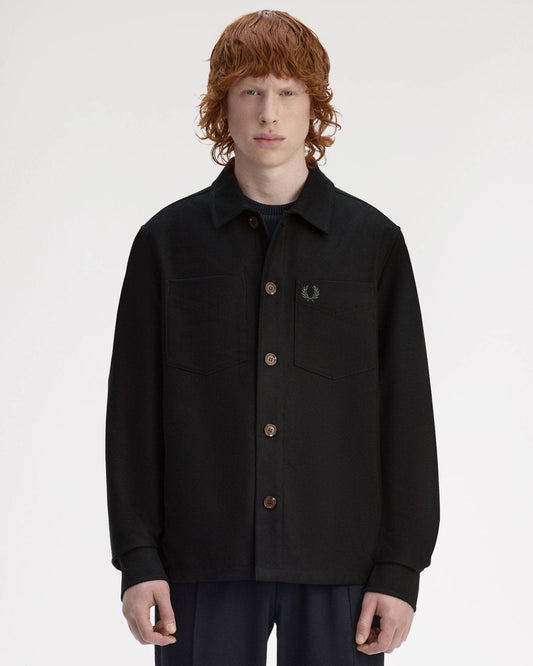 Fred Perry black jacket with a brand logo on a white background