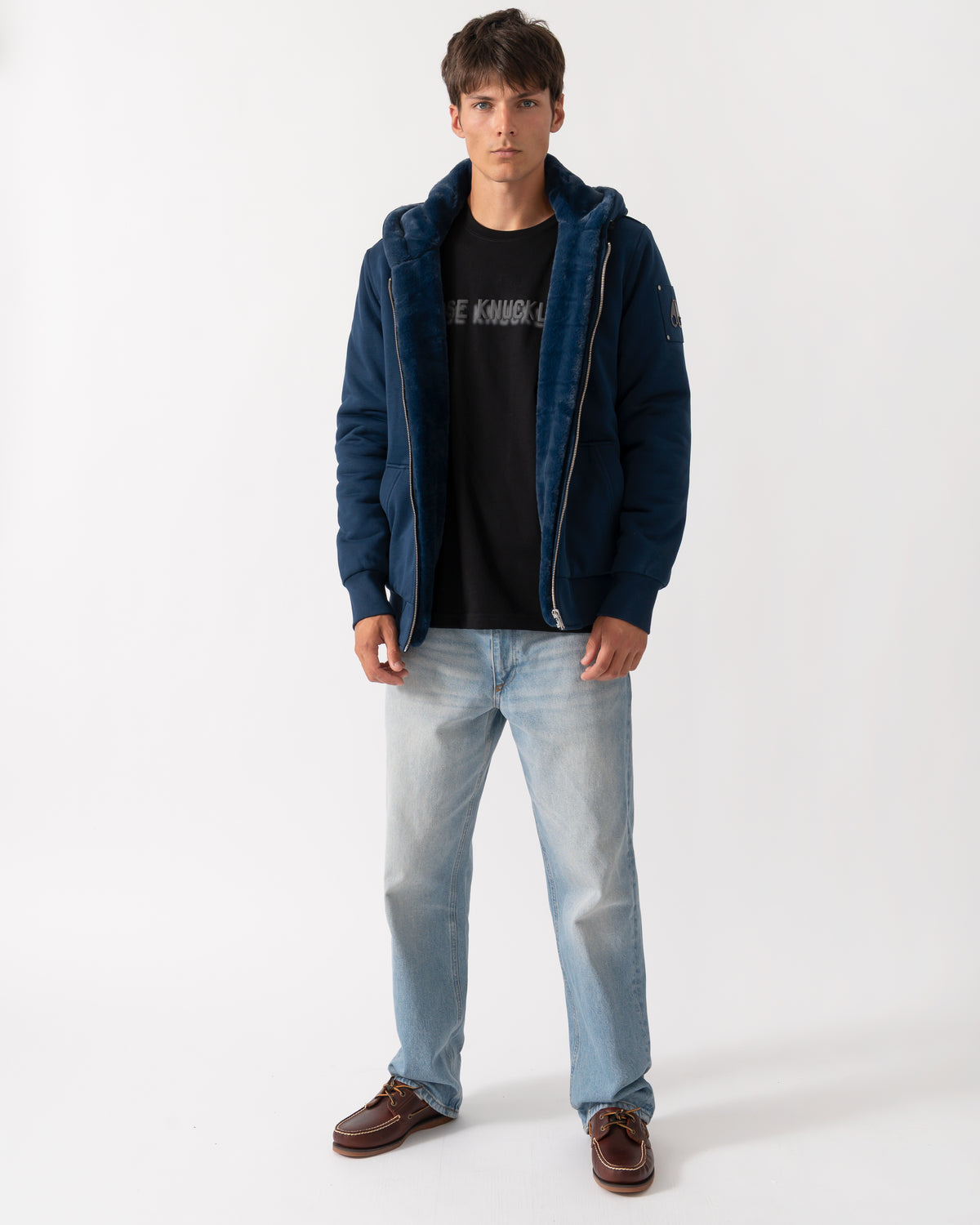 full length of a model wearing a Moose Knuckles Classic Bunny 3 Mens Fleece Hoodie in Nightfall 2017 