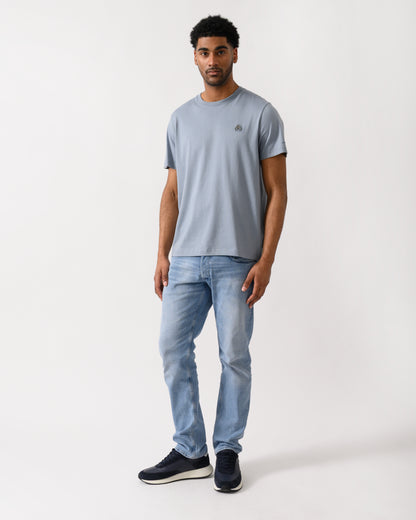 full length shot of a model wearing a Moose Knuckles Crescent Mens T-Shirt in Jet Stream 1884