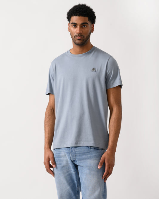 model wearing a Moose Knuckles Crescent Mens T-Shirt in Jet Stream 1884