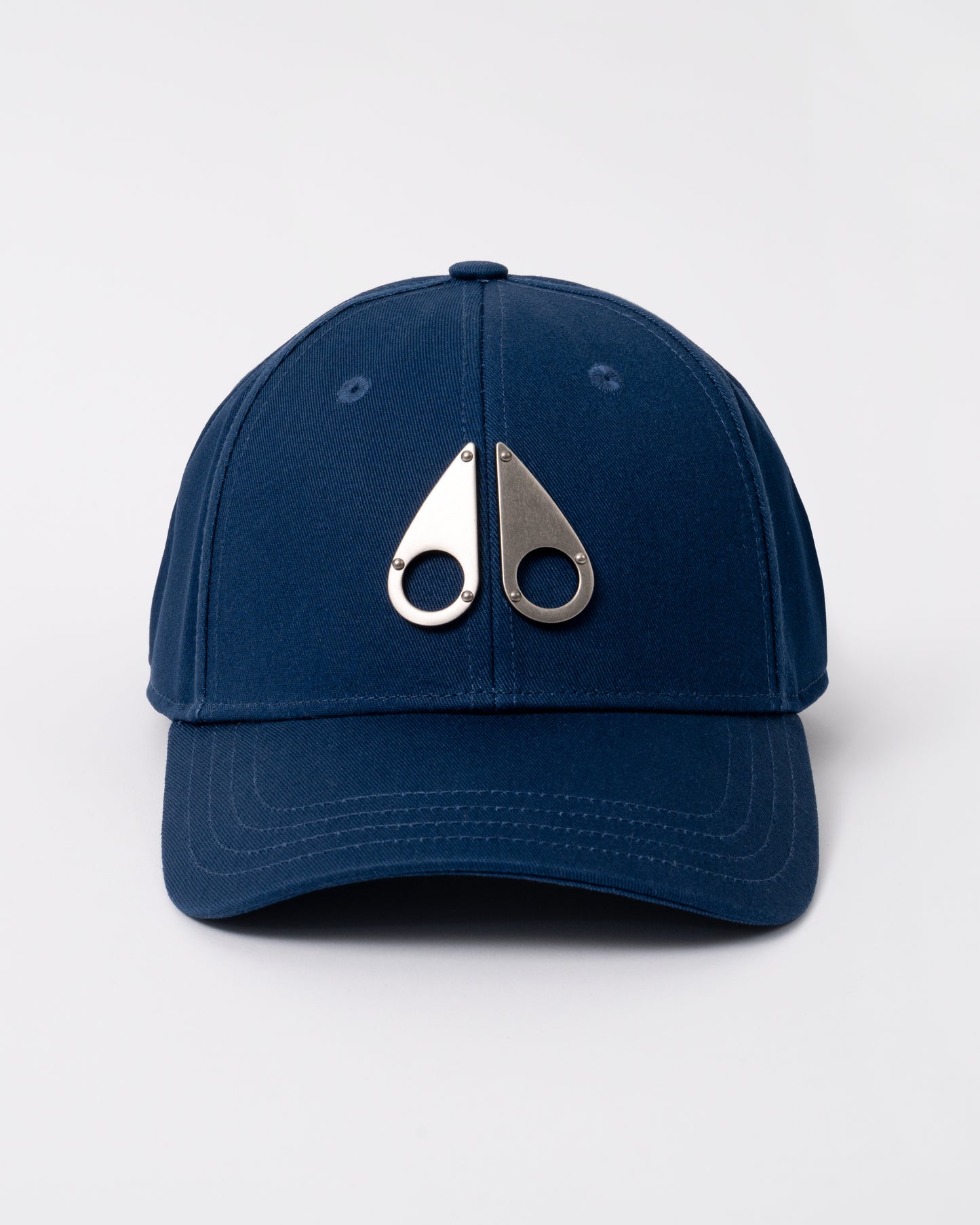 front of a Moose Knuckles Front Logo Icon Cap in Nightfall 1977