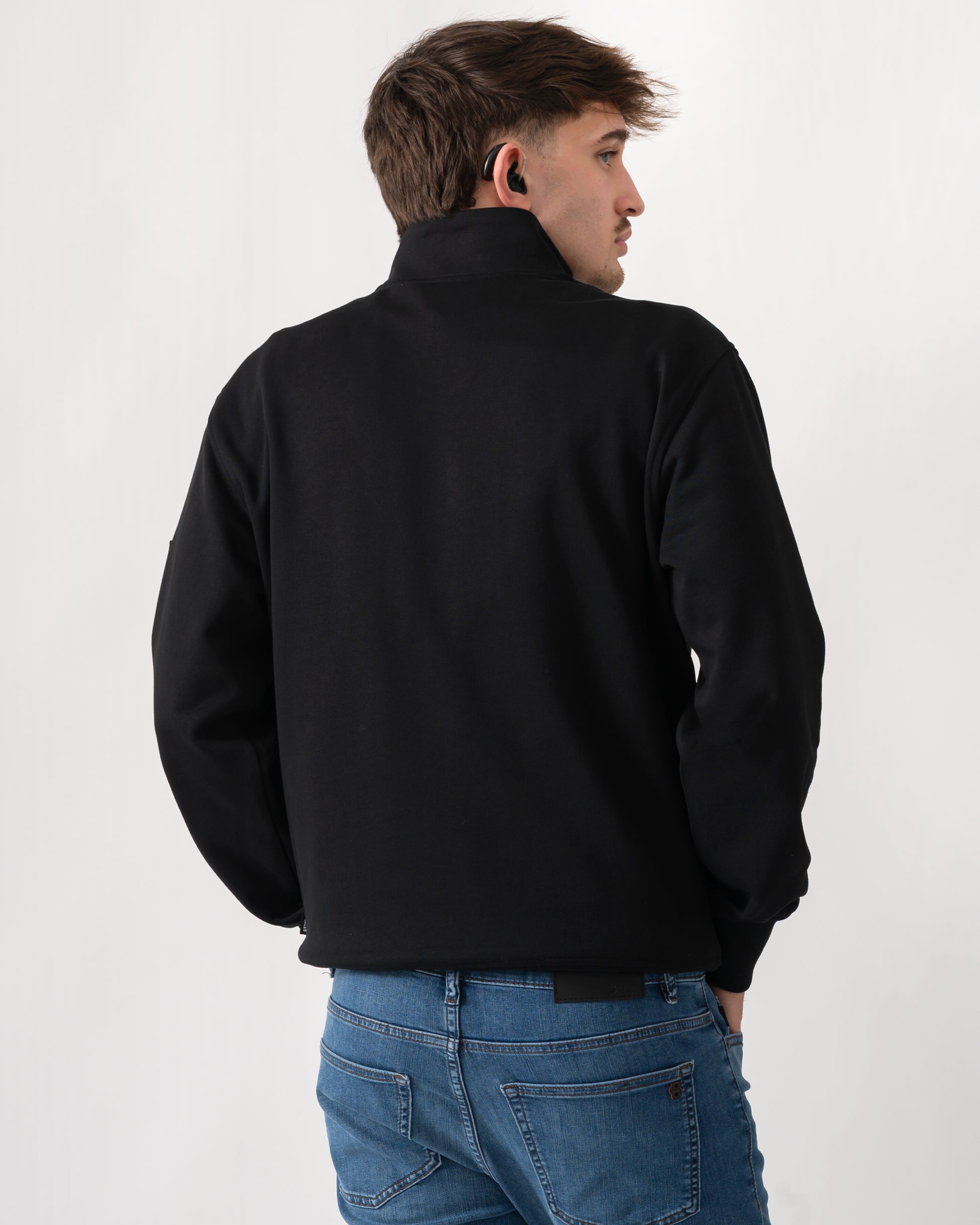 back shot of a model wearing a Moose Knuckles Hartsfield Mens quarter Zip Sweatshirt in Black 292