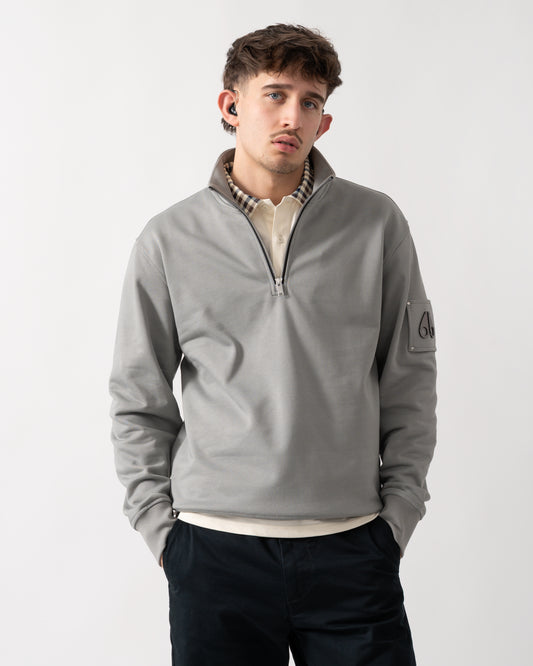 studio shot of a Moose Knuckles Hartsfield Mens 1/4 Zip Sweatshirt in Industry 1892