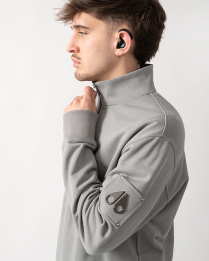 detail shot of a Moose Knuckles Hartsfield Mens 1/4 Zip Sweatshirt in Industry 1892