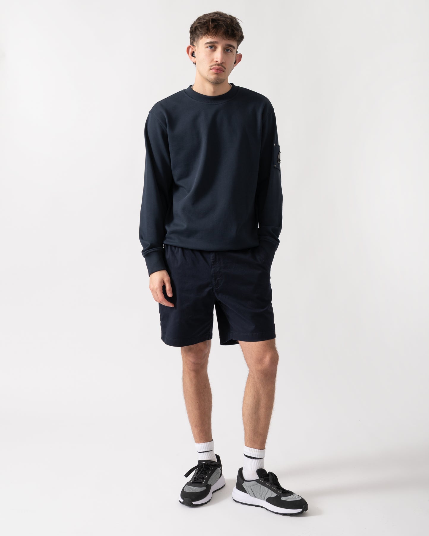 full length shot of a model wearing a Moose Knuckles Hartsfield Mens Crew Neck Sweatshirt in Navy 833