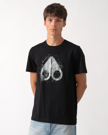 model wearing a Moose Knuckles Mens Icebreak Logo T-Shirt in Black 292