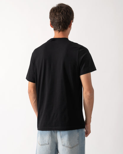 back of a model wearing a Moose Knuckles Mens Icebreak Logo T-Shirt in Black 292