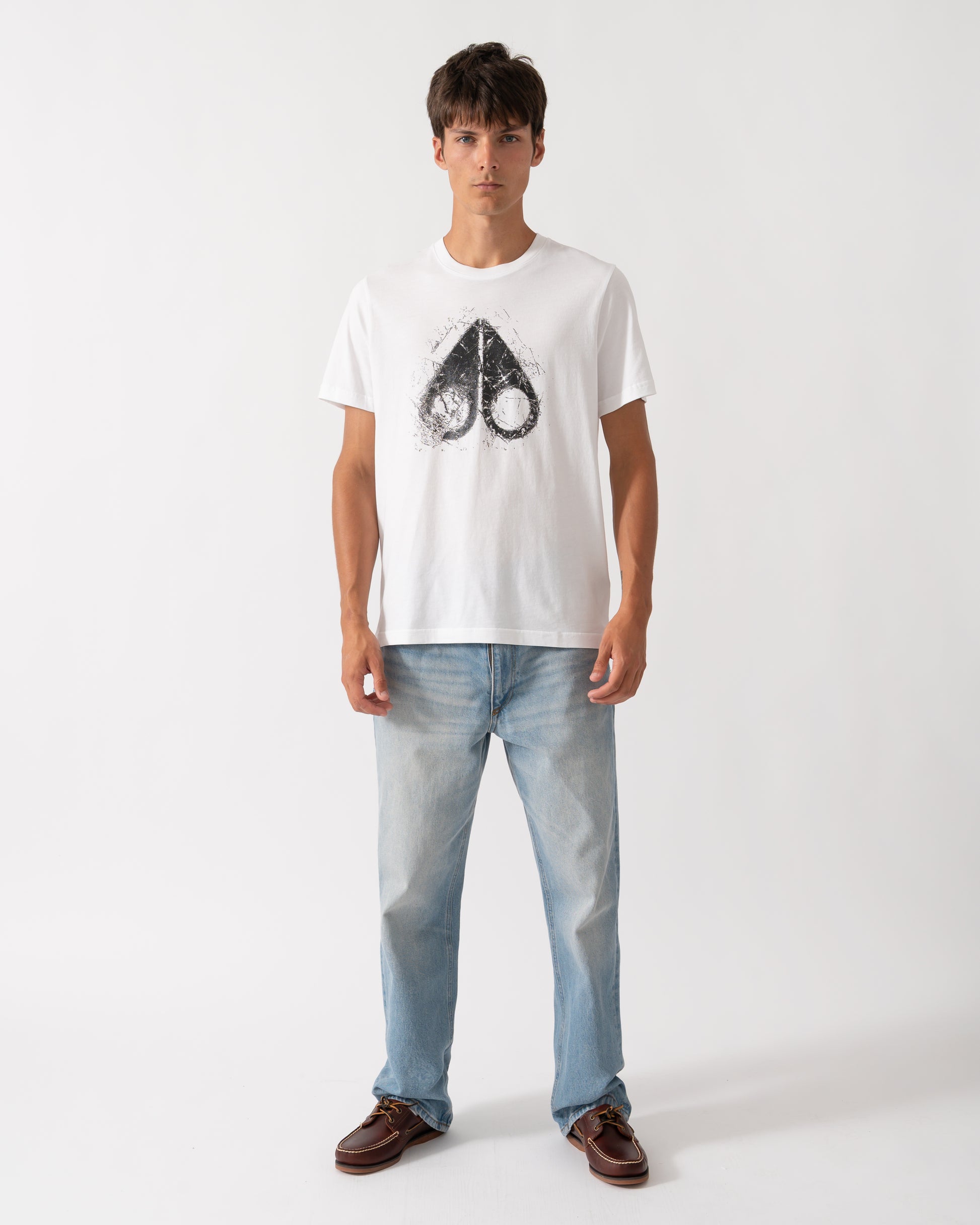 full length of a model wearing a Moose Knuckles Mens Icebreak Logo T-Shirt in White 160