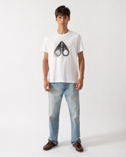 full length of a model wearing a Moose Knuckles Mens Icebreak Logo T-Shirt in White 160