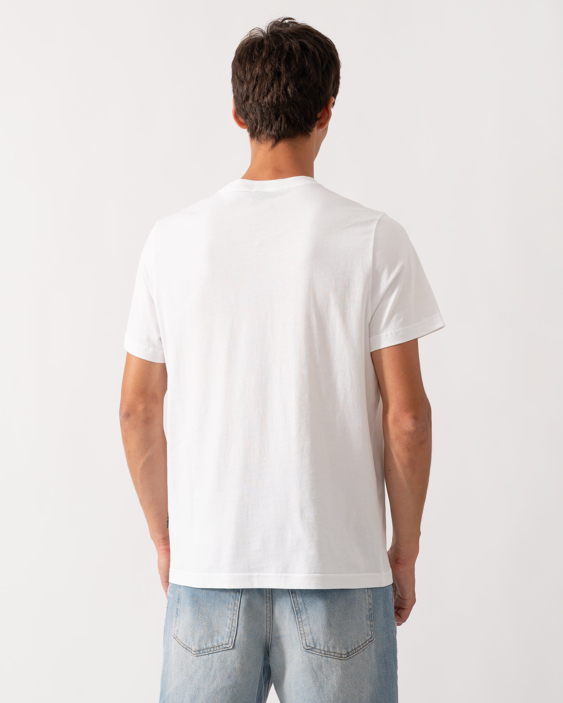 back of a model wearing a Moose Knuckles Mens Icebreak Logo T-Shirt in White 160