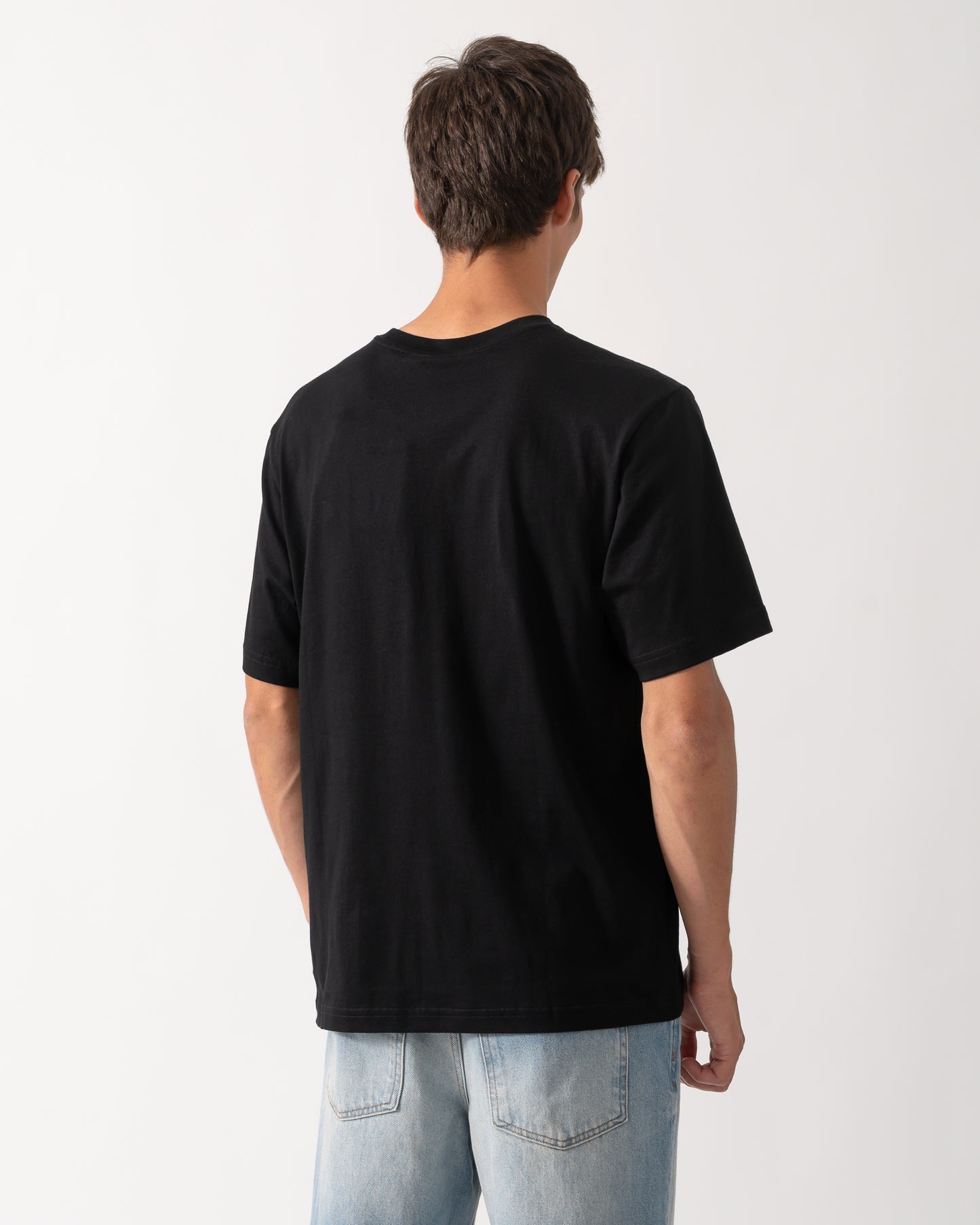 back of model wearing a Moose Knuckles Mens Yul Classic T-Shirt in Black 292