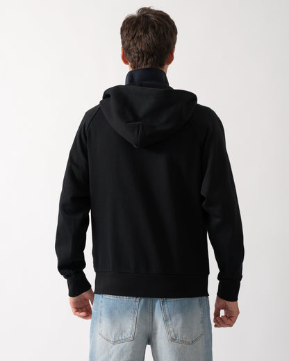 back of a a model wearing a Moose Knuckles Mens Yul Zip Up Hoodie in Black 292