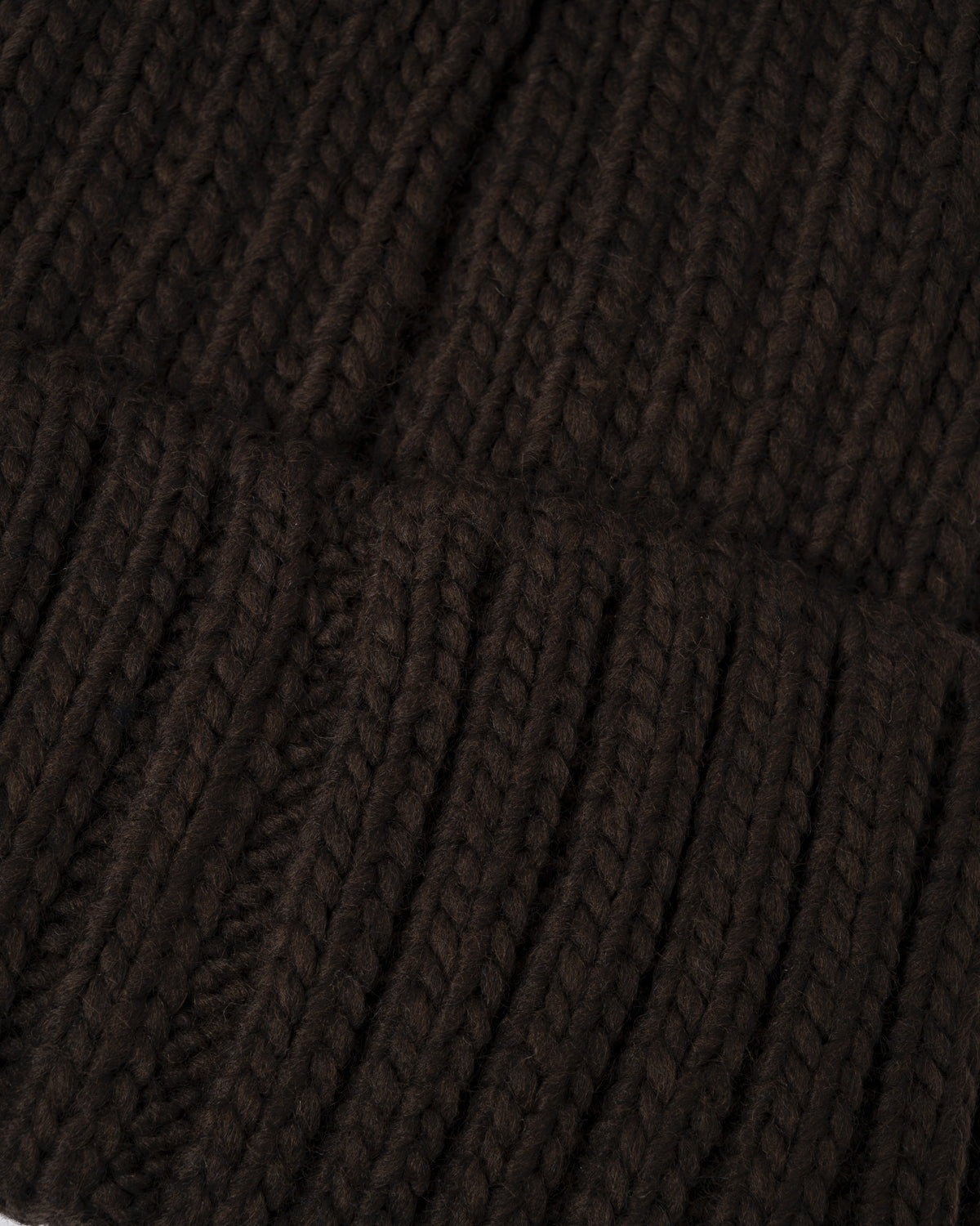 texture detail of a Napapijri Semiury 5 Bobble Hat in Brown WT3
