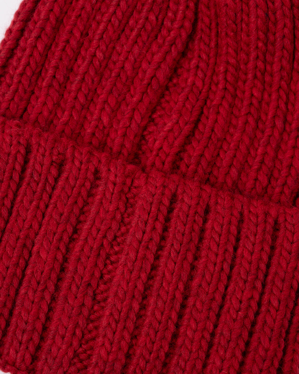texture detail of a Napapijri Semiury 5 Bobble Hat in Haute Red R1F